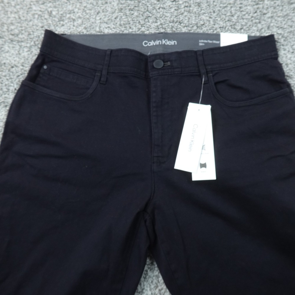 NEW Calvin Klein Jeans Mens 34X32 Black Denim Pants Infinite Flex Waist Stretch